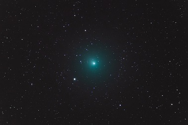 Deep space comet in green
