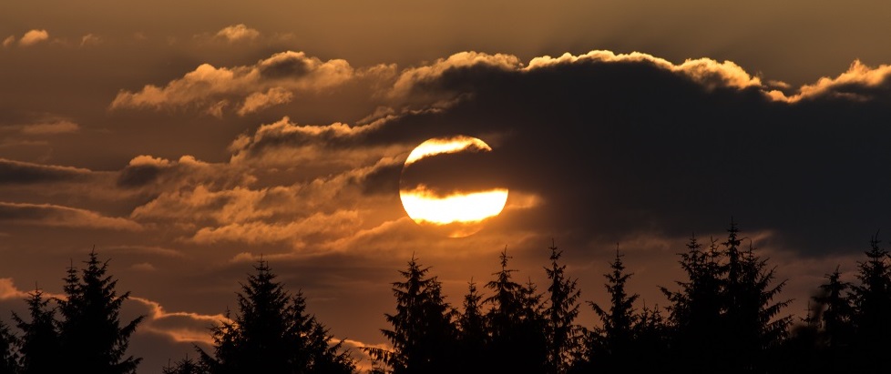 Sunset over Kielder Forest - sunspots can be observed through telescopes when using special solar filters Sunset over Kielder Forest - sunspots can be observed through telescopes when using special solar filters